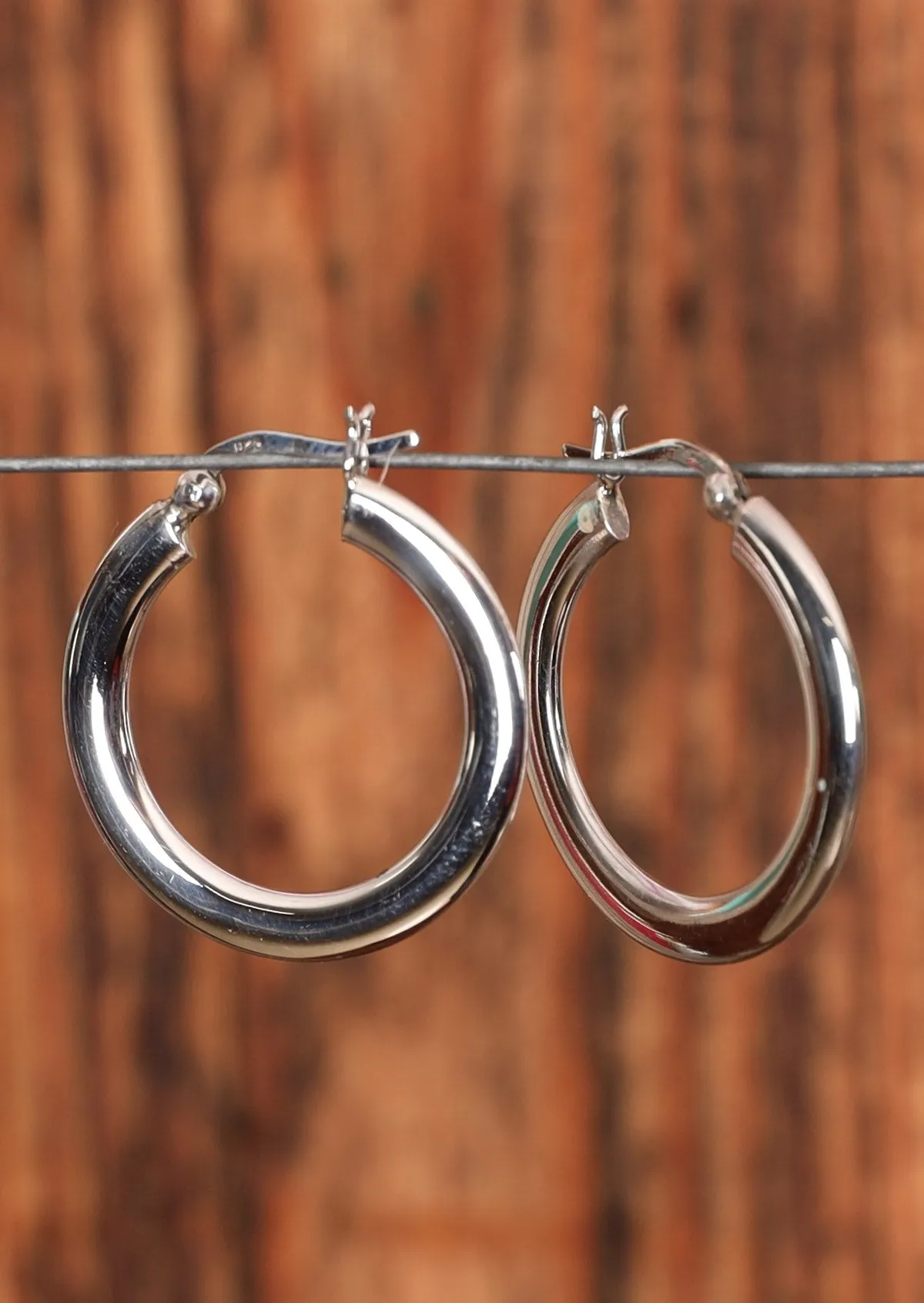 Broad Silver Hoop Earrings