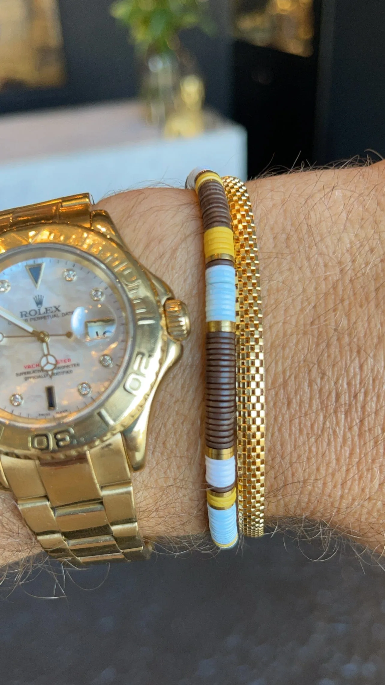 Men's Beaded Bracelet with Blue, Brown, Orange, White, and Gold Disc Beads